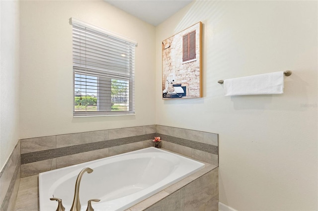 full bathroom featuring a garden tub