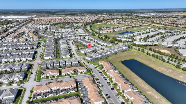 aerial view featuring a water view and a residential view