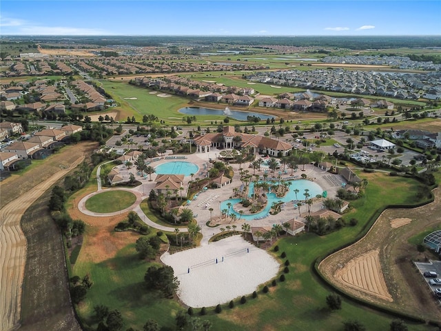 bird's eye view featuring a residential view and a water view