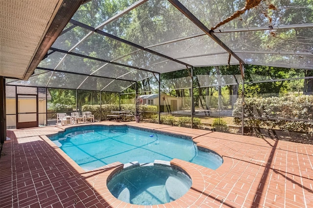 16017 Harbar Oaks Dr, Montverde, FL 34756 - view of pool with a pool with connected hot tub, a patio, and glass enclosure