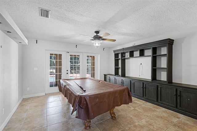 16017 Harbar Oaks Dr, Montverde, FL 34756 - playroom featuring french doors, billiards, ceiling fan, light tile patterned flooring, and a textured ceiling