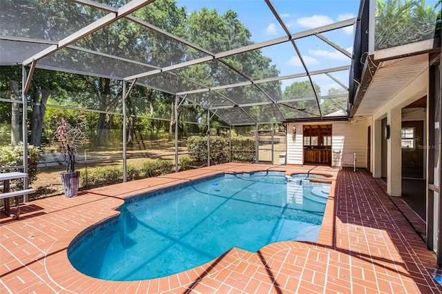 16017 Harbar Oaks Dr, Montverde, FL 34756 - view of pool featuring a patio area, a lanai, and a pool with connected hot tub