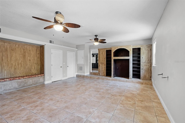 16017 Harbar Oaks Dr, Montverde, FL 34756 - unfurnished living room with a ceiling fan, light tile patterned floors, and baseboards