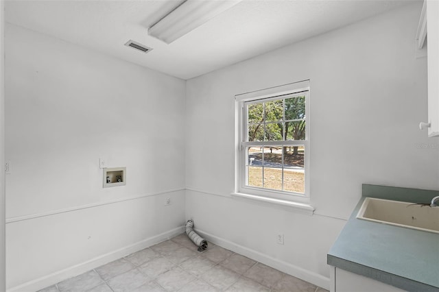 16017 Harbar Oaks Dr, Montverde, FL 34756 - laundry area featuring baseboards and hookup for a washing machine