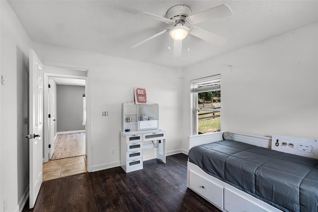 16017 Harbar Oaks Dr, Montverde, FL 34756 - bedroom with wood finished floors, baseboards, and ceiling fan