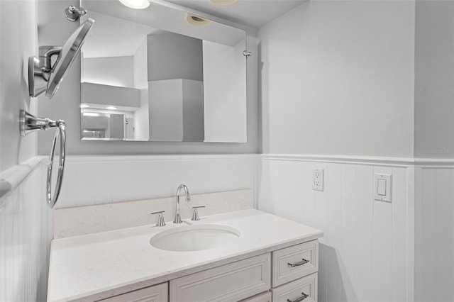16017 Harbar Oaks Dr, Montverde, FL 34756 - bathroom featuring wainscoting and vanity