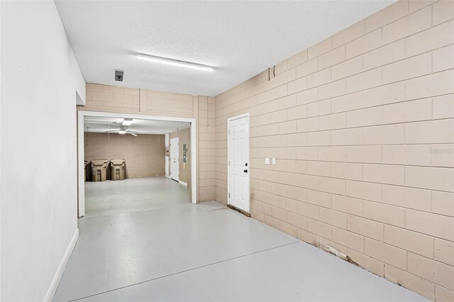 16017 Harbar Oaks Dr, Montverde, FL 34756 - hall featuring concrete floors and a textured ceiling