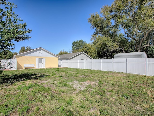 view of yard with fence