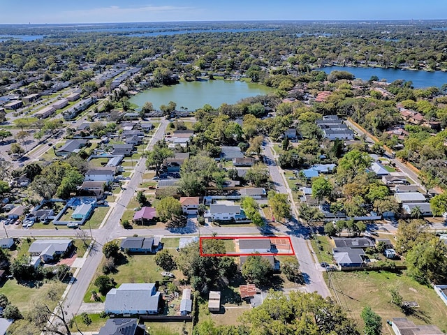 birds eye view of property featuring a residential view and a water view