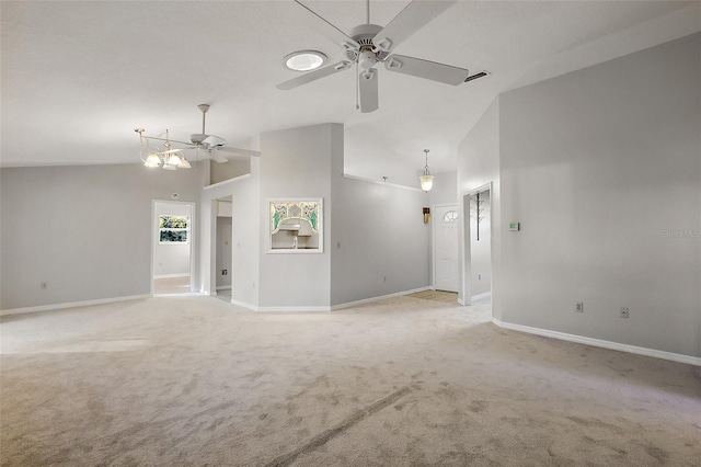 unfurnished living room with light carpet, high vaulted ceiling, ceiling fan, and baseboards