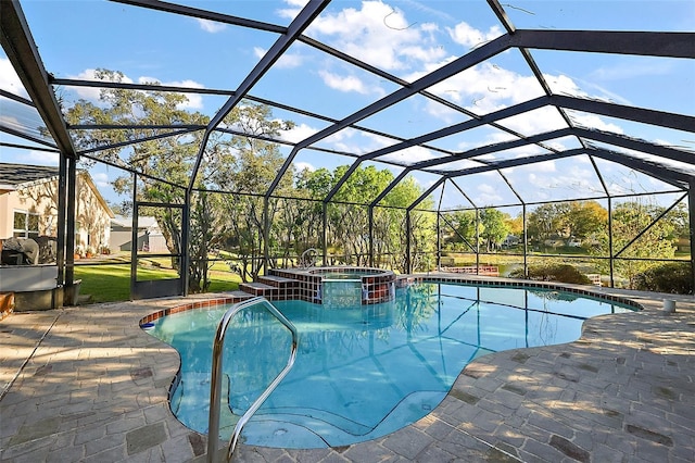 view of pool featuring a patio, glass enclosure, and a pool with connected hot tub