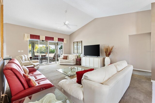 living room featuring high vaulted ceiling, carpet flooring, ceiling fan, and baseboards