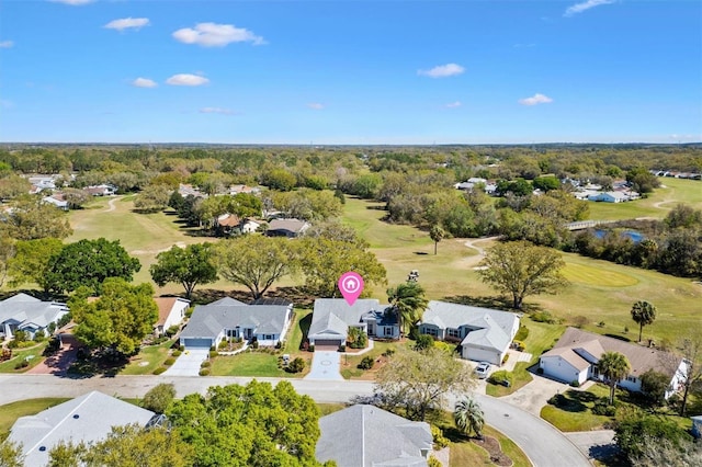 bird's eye view featuring view of golf course and a residential view