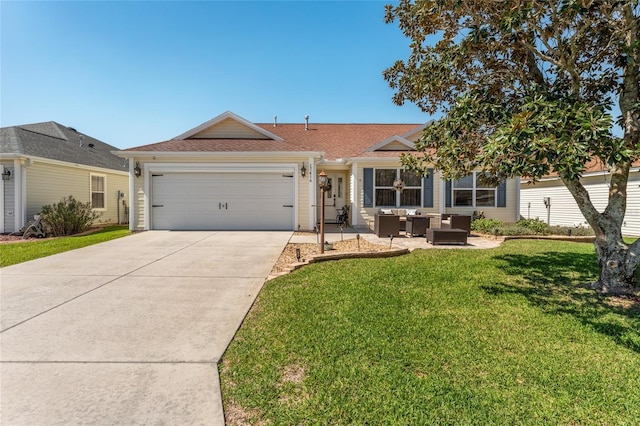 ranch-style house featuring a garage, a front yard, and concrete driveway