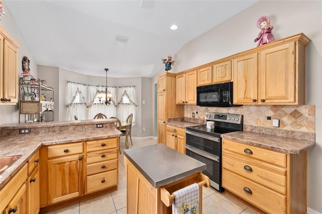 kitchen with light tile patterned floors, decorative backsplash, vaulted ceiling, double oven range, and black microwave