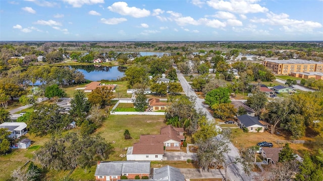 aerial view featuring a residential view and a water view