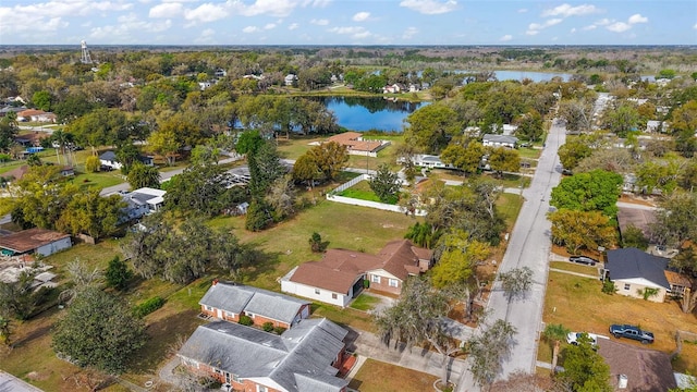 aerial view with a residential view and a water view