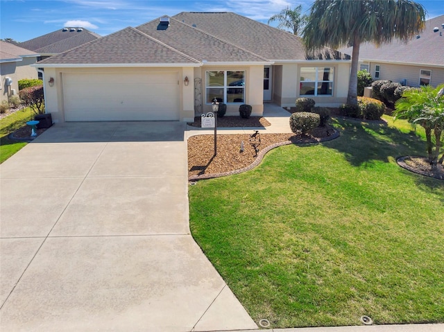 single story home with a front lawn, concrete driveway, roof with shingles, stucco siding, and an attached garage