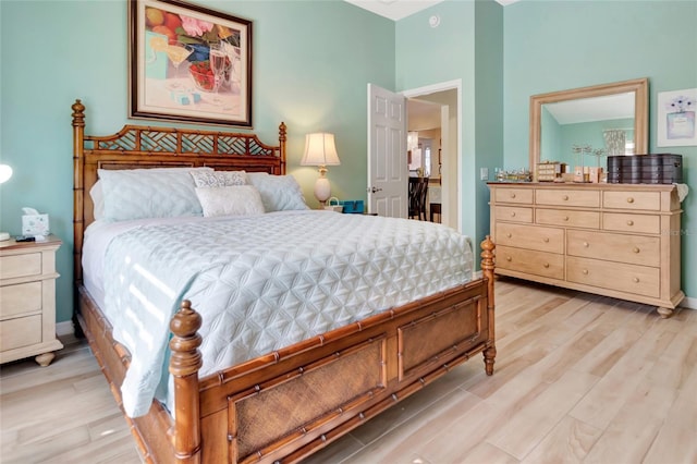 bedroom with light wood-type flooring