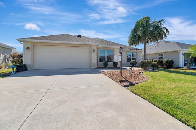 ranch-style house with a shingled roof, a front lawn, concrete driveway, stucco siding, and a garage