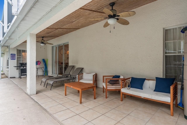 view of patio / terrace featuring ceiling fan