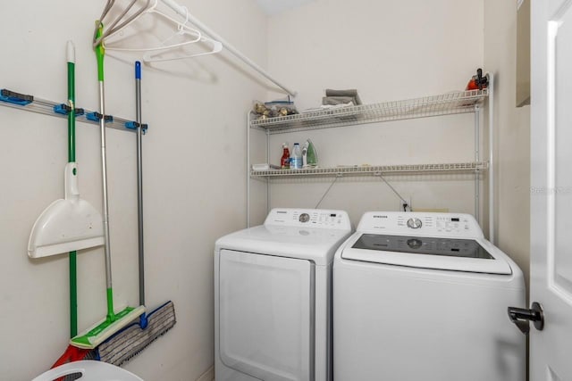 laundry area featuring washer and dryer and laundry area