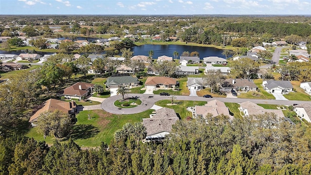 bird's eye view with a water view and a residential view