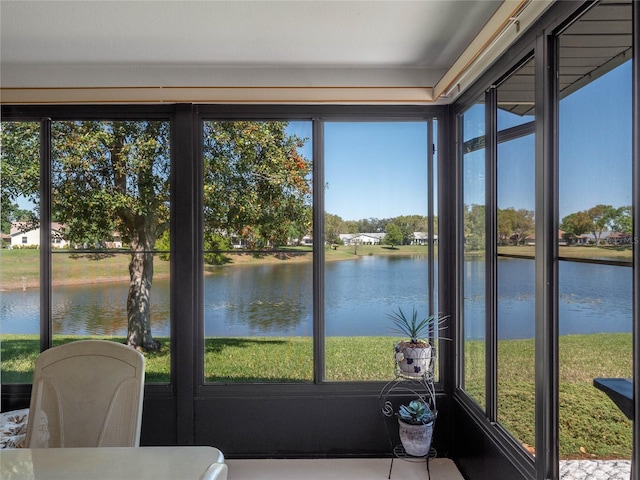 sunroom with a water view