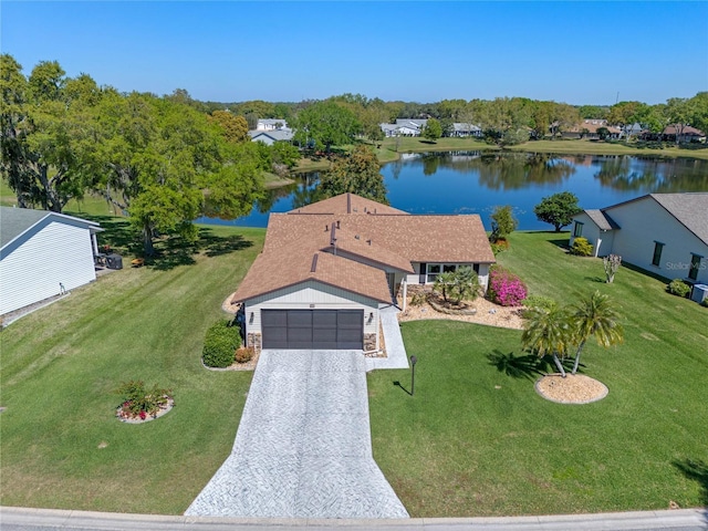 bird's eye view with a water view