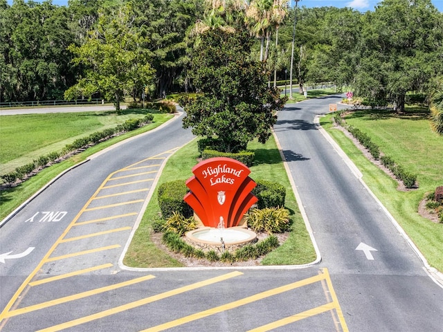 view of road with curbs