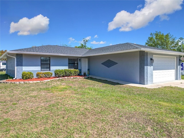 ranch-style home featuring a front yard, a garage, and a shingled roof