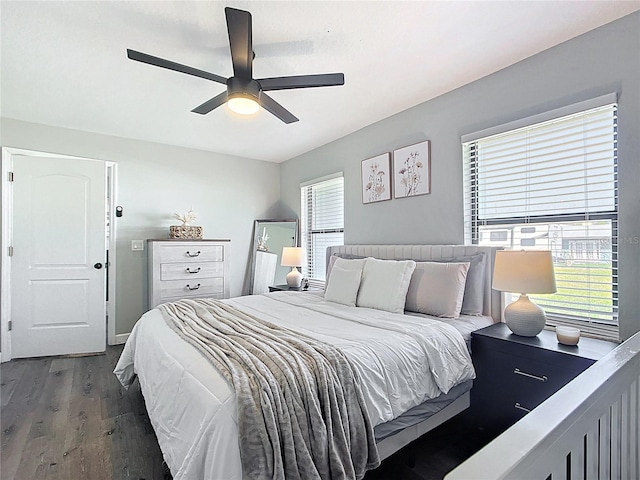 bedroom with a ceiling fan and wood finished floors