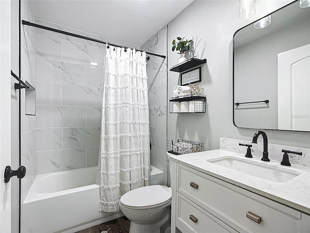 bathroom with vanity, toilet, and shower / tub combo with curtain