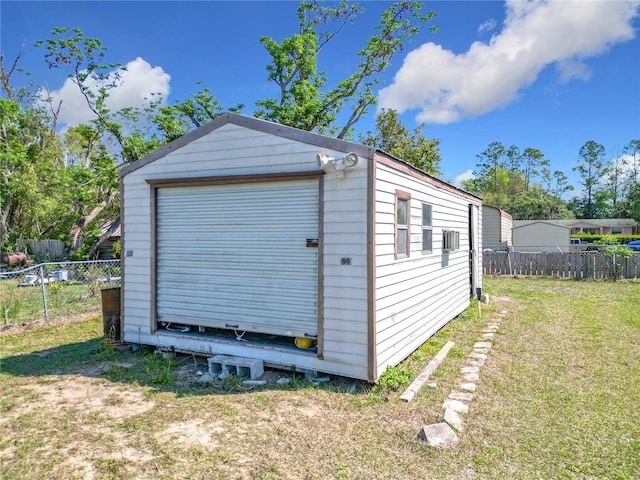 garage with fence