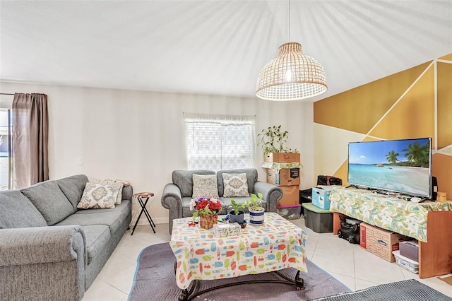 living area with tile patterned floors