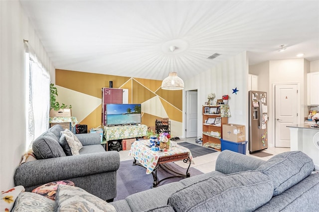 living room featuring visible vents