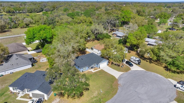 aerial view with a wooded view