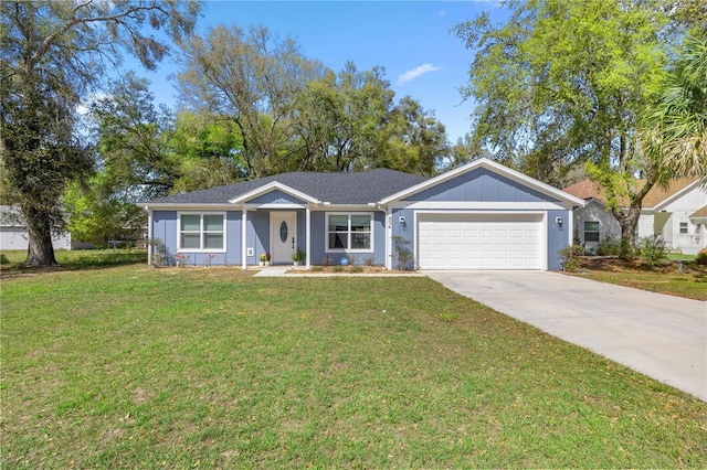 ranch-style home featuring an attached garage, a front lawn, board and batten siding, and concrete driveway