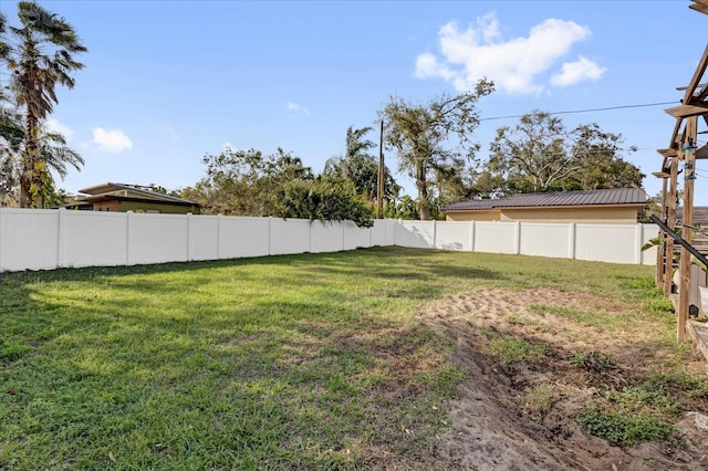 view of yard with fence