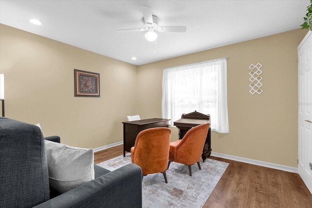 home office featuring a ceiling fan, recessed lighting, baseboards, and wood finished floors