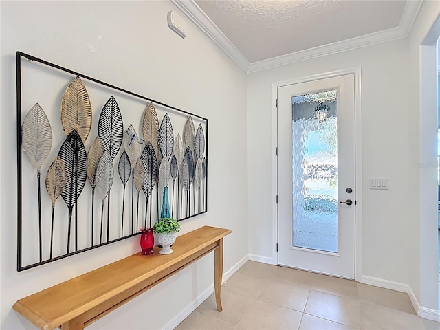 doorway to outside featuring light tile patterned flooring, a textured ceiling, baseboards, and ornamental molding