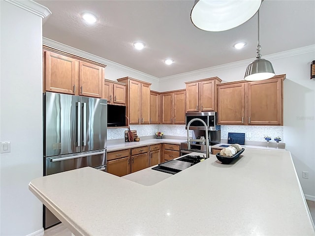 kitchen featuring decorative backsplash, stainless steel appliances, light countertops, and ornamental molding