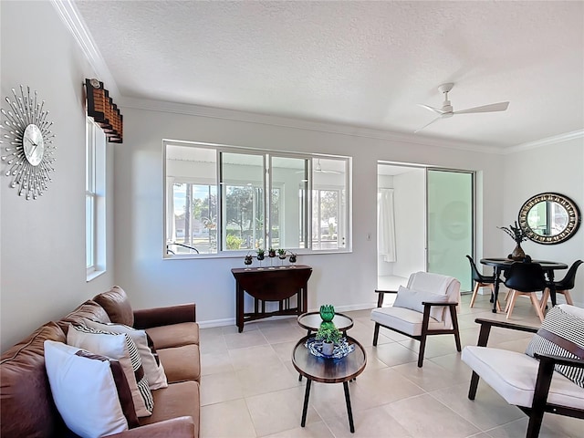 living room featuring light tile patterned flooring, a textured ceiling, crown molding, and a ceiling fan