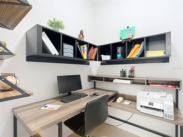 home office with tile patterned flooring