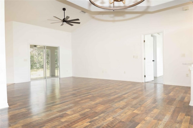 unfurnished room featuring visible vents, high vaulted ceiling, wood finished floors, and a ceiling fan