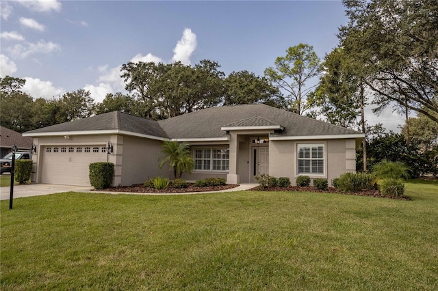 view of front of house featuring a front lawn, an attached garage, concrete driveway, and stucco siding