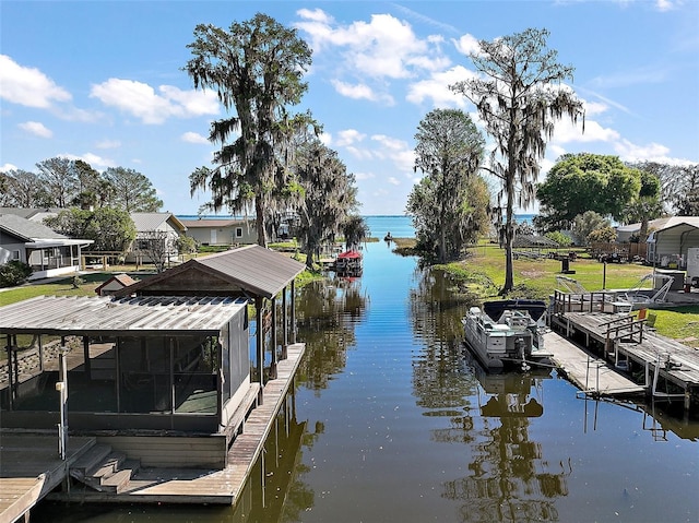 dock area featuring a water view