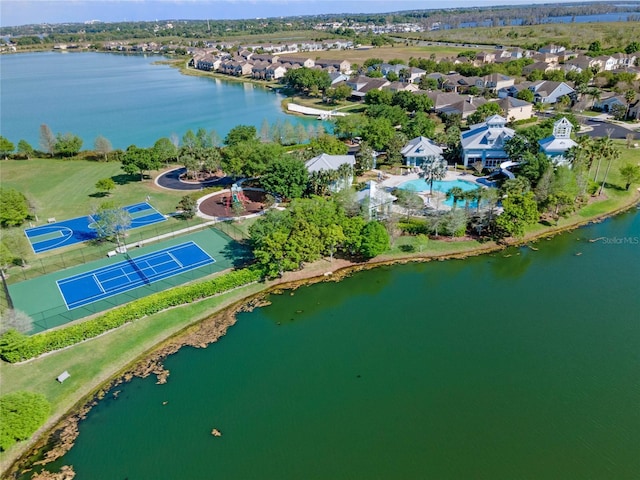 birds eye view of property with a residential view and a water view