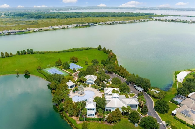 birds eye view of property with a water view