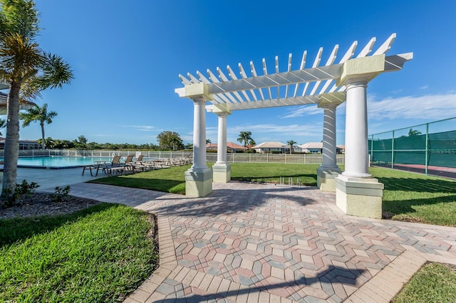 view of patio / terrace with fence and a pergola